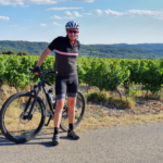 A cyclist in the vineyards